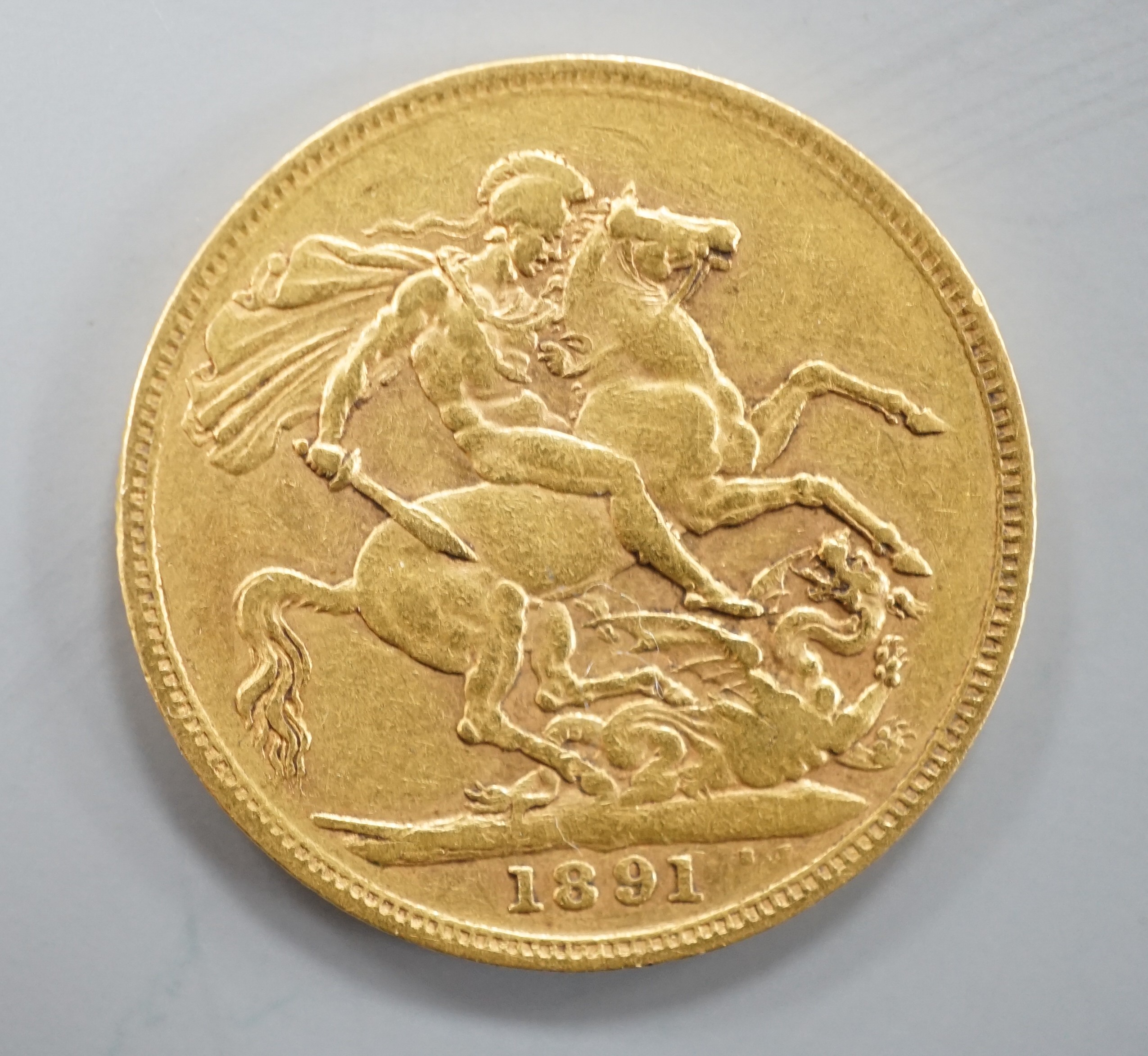 A Victorian 1891 gold sovereign.